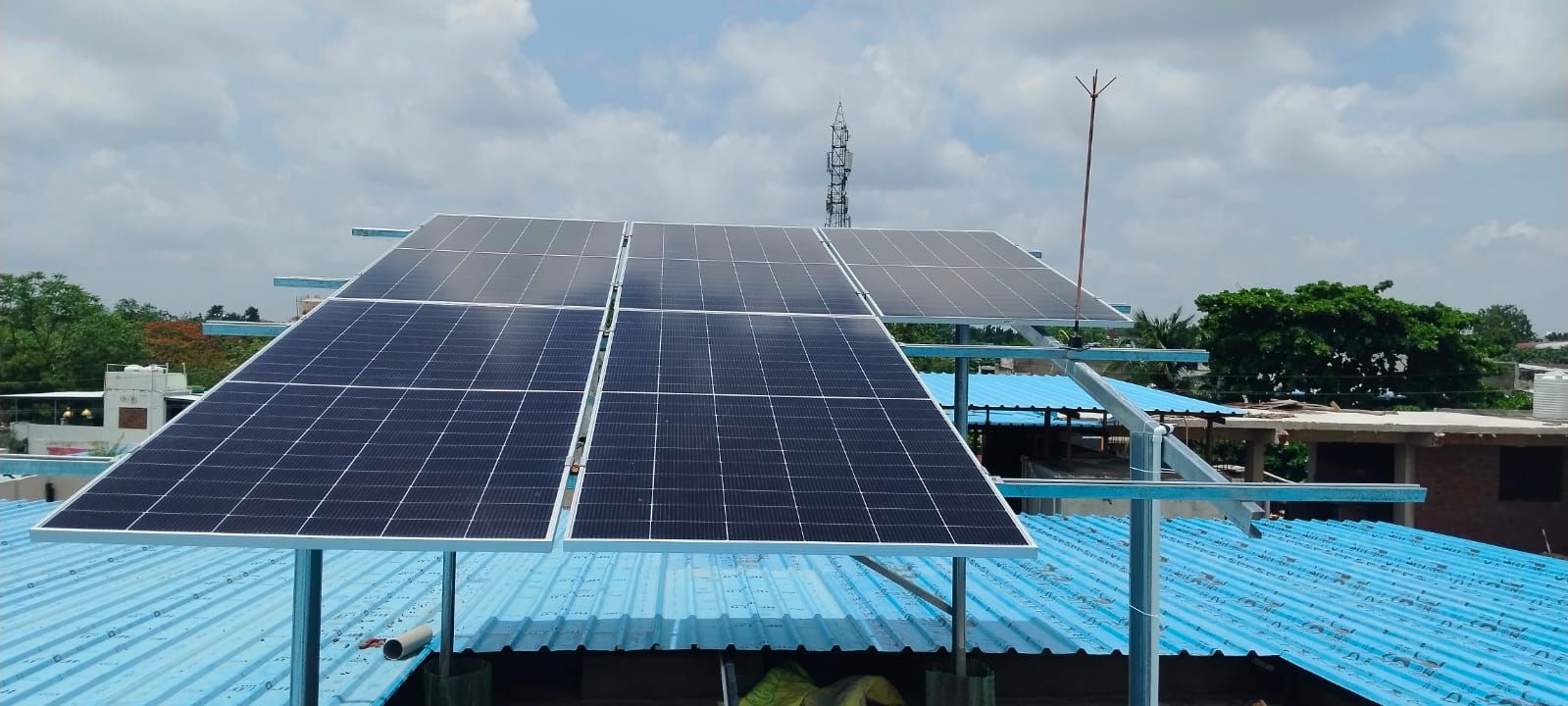 Rooftop solar array installed above a building roof